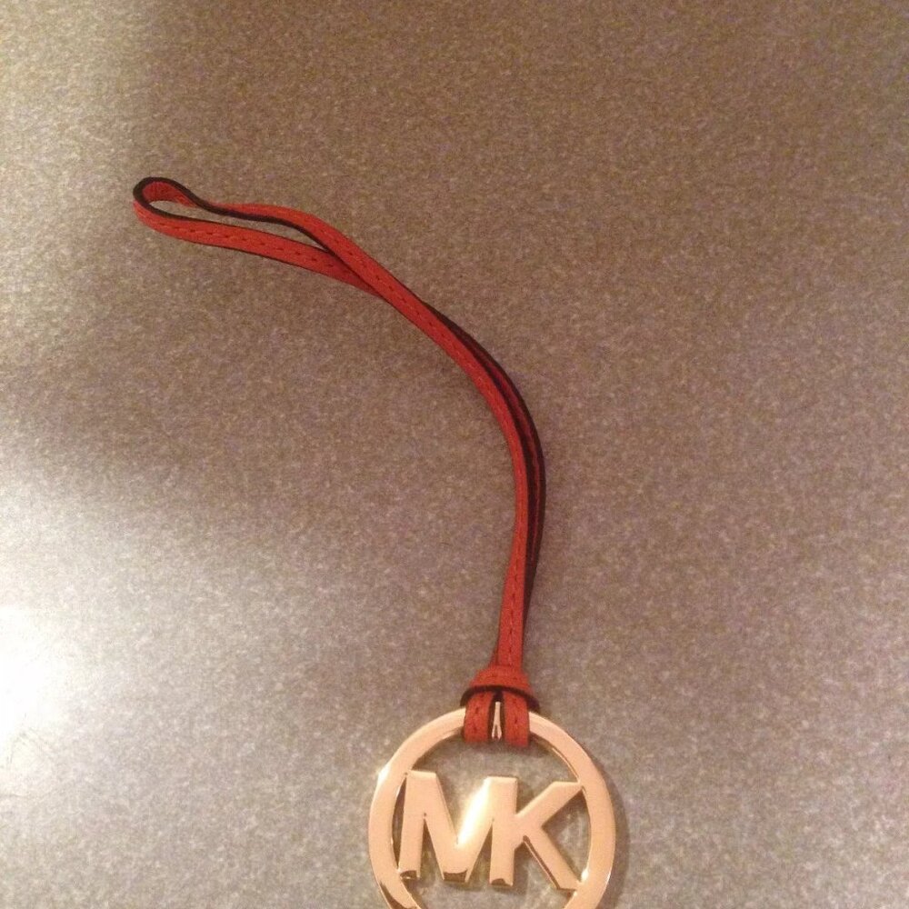 Brand new large 2" Michael Kors GOLD tone purse charm with 7" TANGERINE saffiano